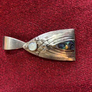 Sterling Silver pendant featuring both an abalone and opal inlay